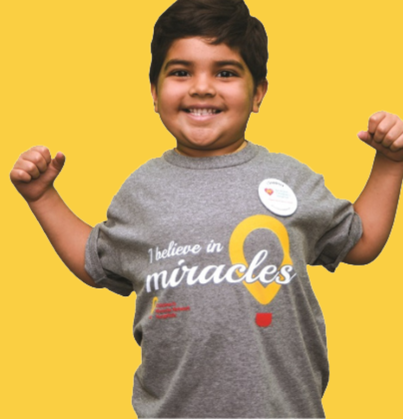 Leo smiling in his Children's Miracle Network t-shirt