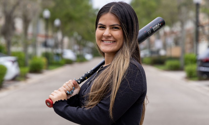 Emma with her baseball bat